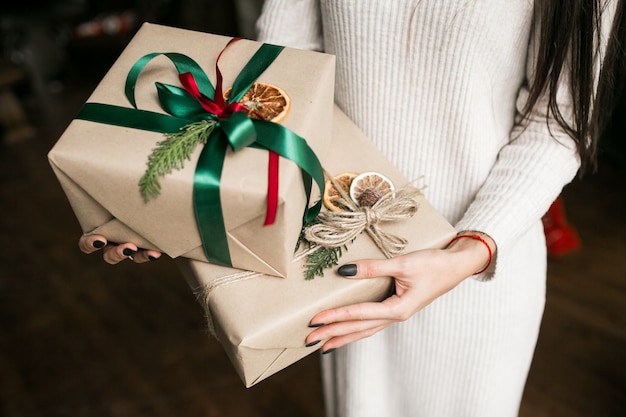 Woman holding Christmas presents