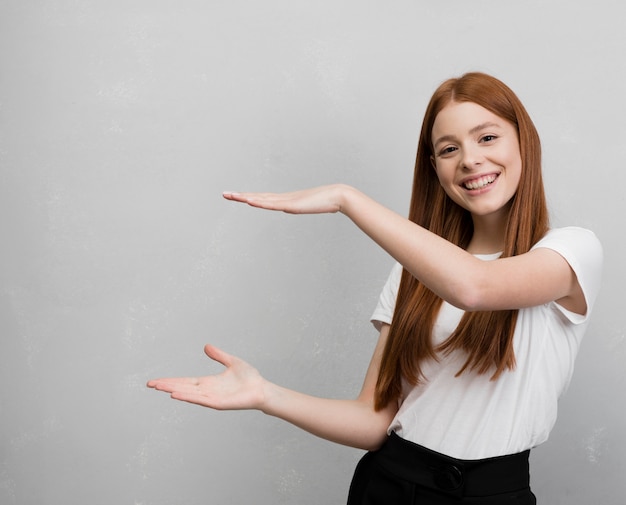 Woman holding copy space