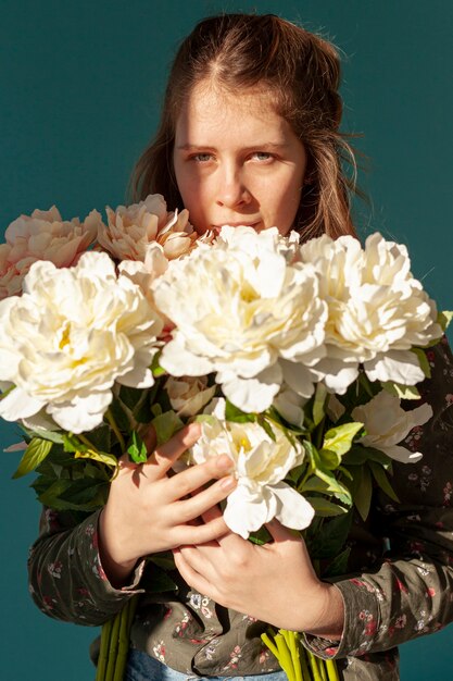 Woman holding flower bouquet