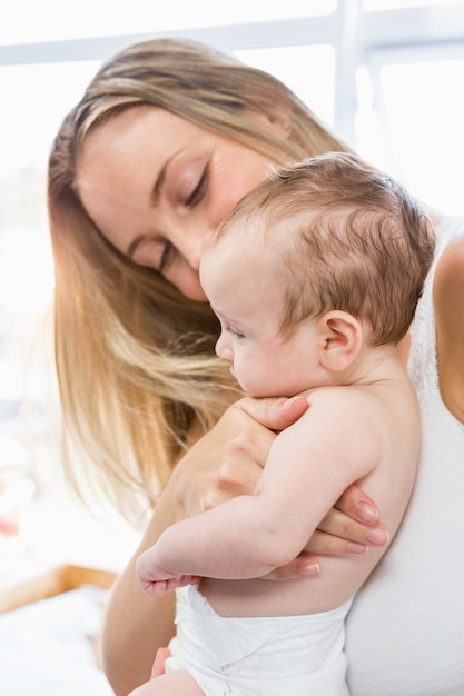 Woman holding her baby boy