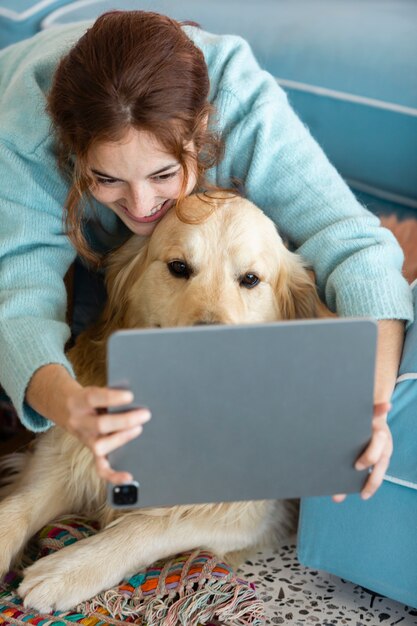 Woman holding tablet medium shot