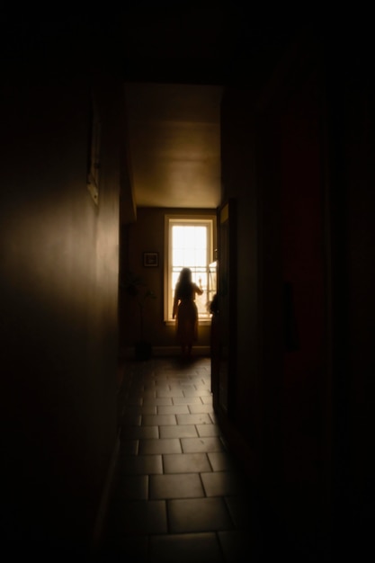 Woman at home with mysterious lights around her