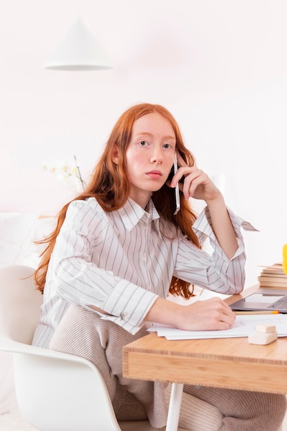 Woman at home working on laptop