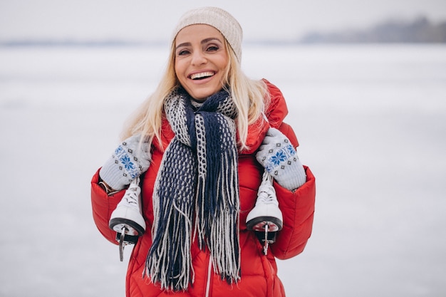 Free photo woman ice skating at the lake