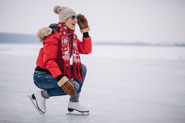 Free photo woman ice skating at the lake