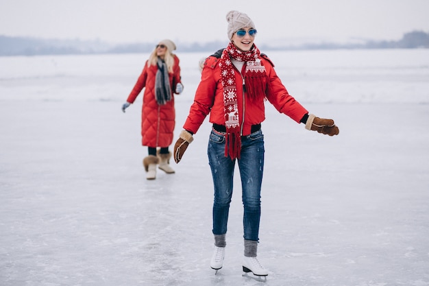 Free photo woman ice skating at the lake