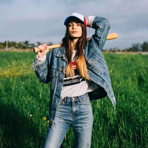 Free Photo woman in jeans looking at camera