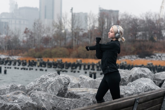 Free photo woman jogging in the winter time