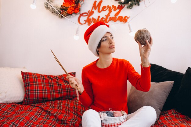 Woman knitting on Christmas