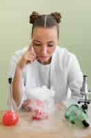 Free photo woman in lab doing experiment