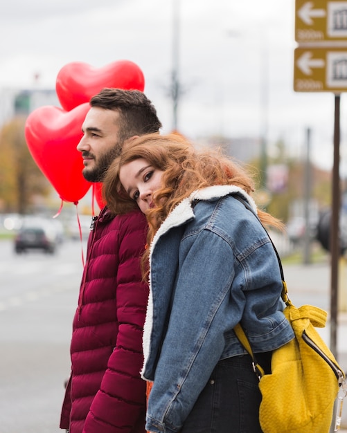 Free Photo woman leaning on mans shoulder