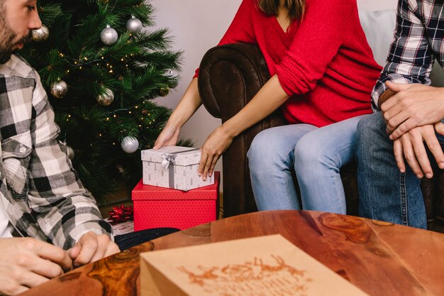 Woman lifting gift box