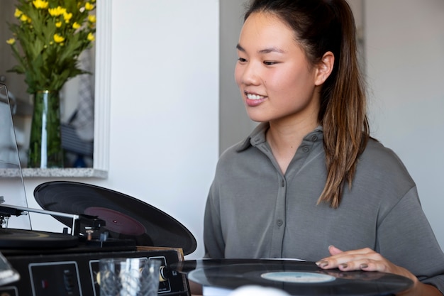 Woman listening to music at home