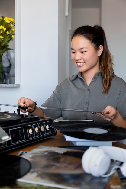 Woman listening to music at home