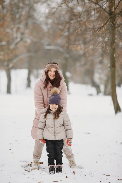 Woman and little girl in a park