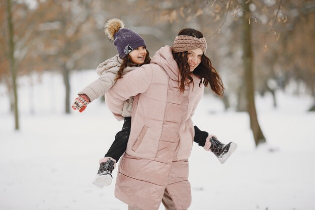 Woman and little girl in a park