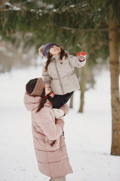 Woman and little girl in a park