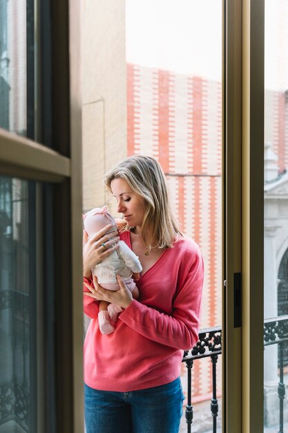 Woman looking at baby