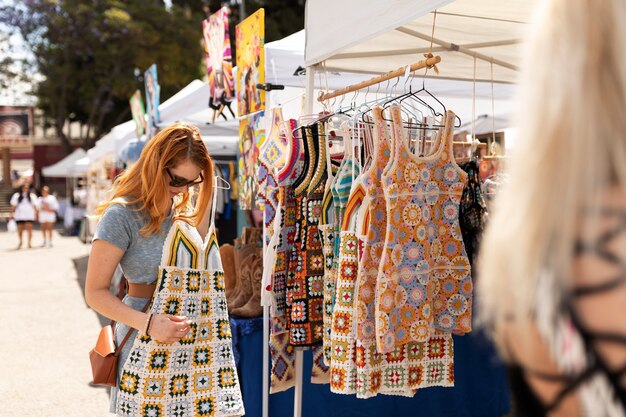 Woman looking at clothes side view