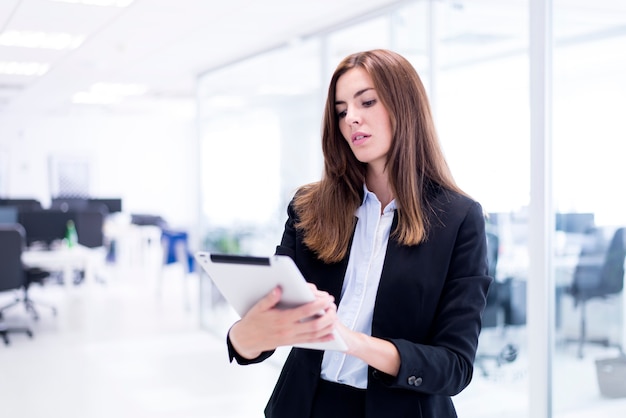 Woman looking a tablet