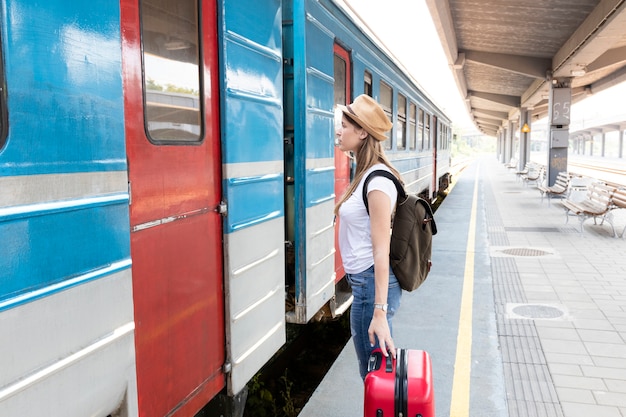 Woman looking at the train