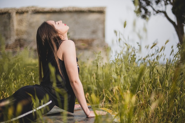 Free photo woman lying and meditating