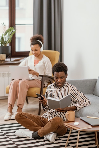 Woman and man remote working from home