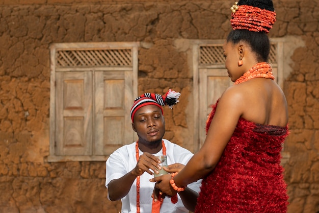 Woman and man wearing jewelry