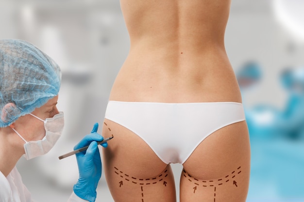 Free photo woman marked out for cosmetic surgery