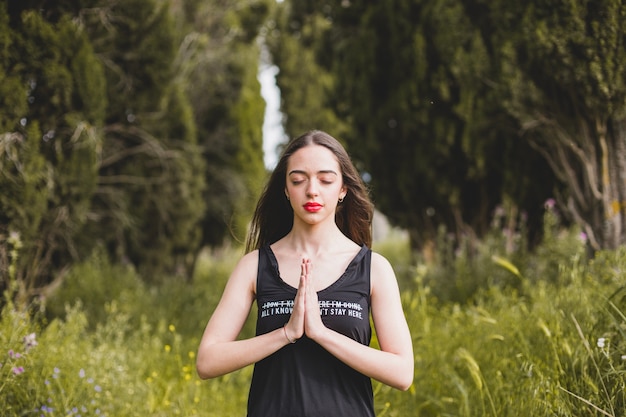 Woman meditating in nature