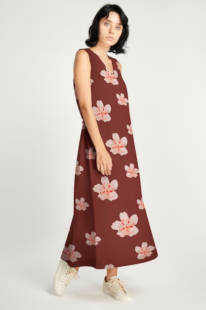 Woman model posing in floral long dress apparel