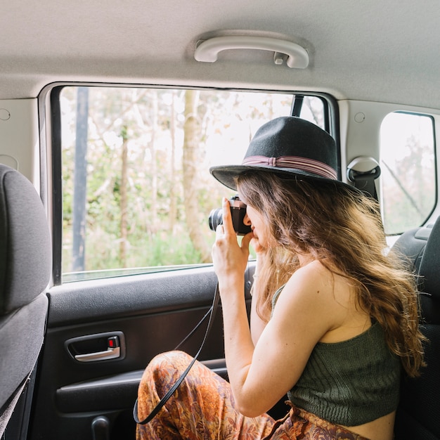 Woman out of car window