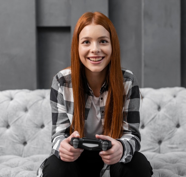 Free Photo woman playing video games