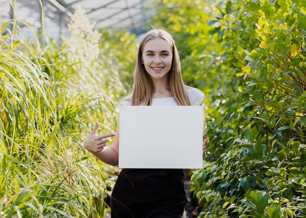 Woman pointing at blank sheet