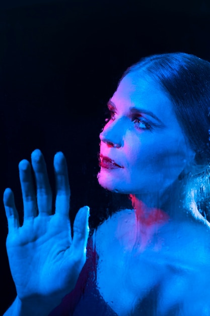 Woman portrait with blue lights visual effects