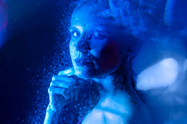 Woman portrait with blue lights visual effects