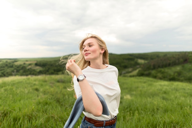 Woman posing outdoors in nature