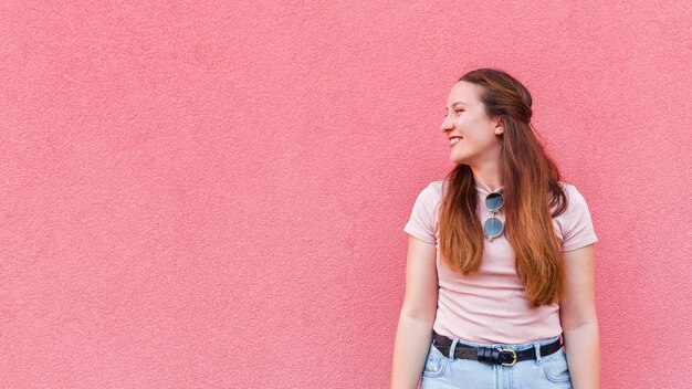 Woman posing outdoors with copy space