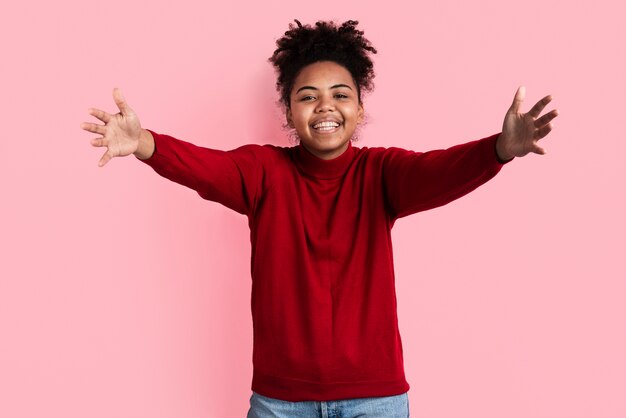 Woman posing with arms wide open