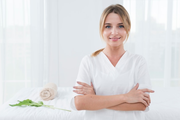 Woman posing with bathrobe in a spa