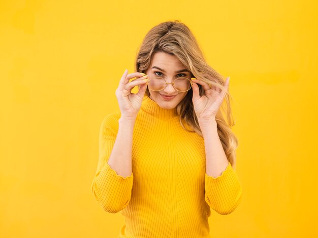 Woman posing with glasses