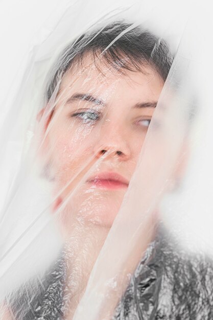 Woman posing with plastic foil