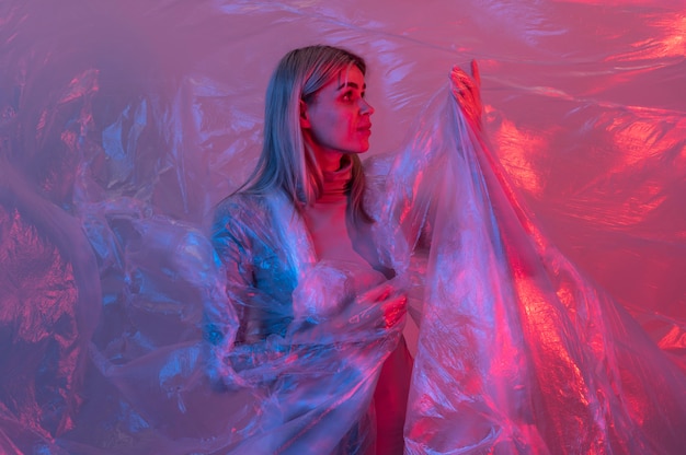 Woman posing with plastic foil