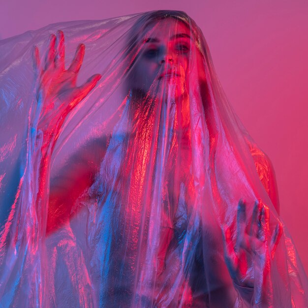 Woman posing with plastic foil