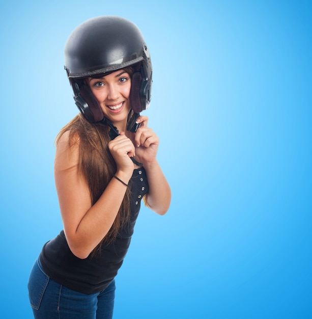 Free photo woman posing with protection helmet on head.