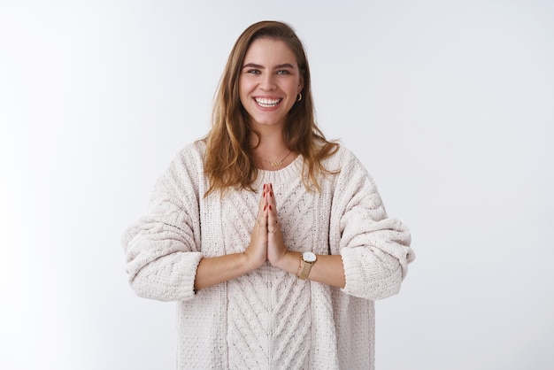 Free Photo woman practising yoga calm down release stress acting healthy wellbeing lifestyle press palms together namaste praying gesture smiling happy white teeth expressing positivity studio background