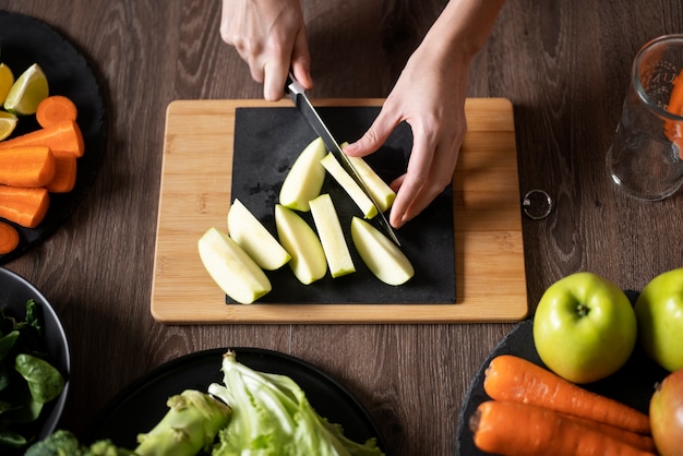 Free photo woman preparing her juice recipe