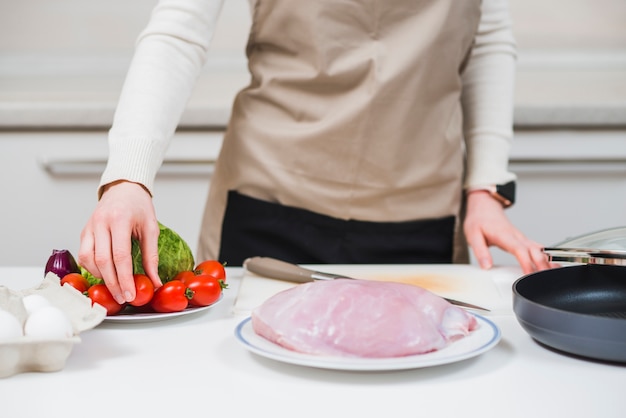 Woman preparing turkey dish