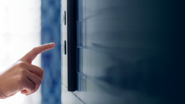 Free Photo woman pressing an elevator button