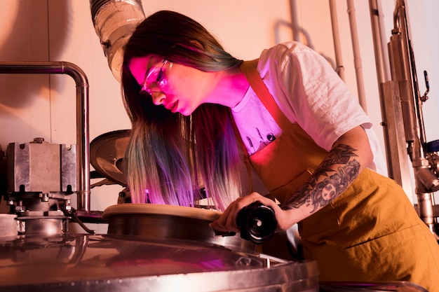 Woman producing craft beer